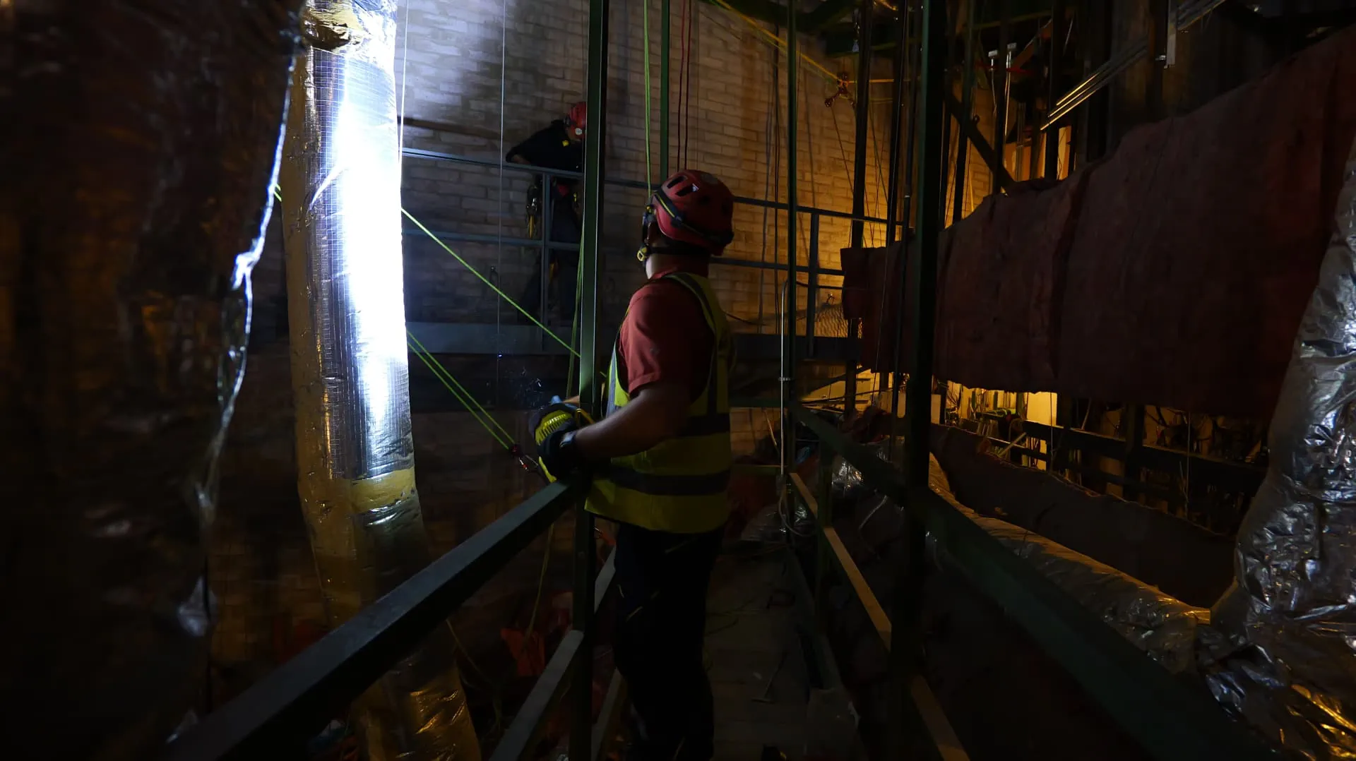 ARS technician managing rope lines inside an industrial structure