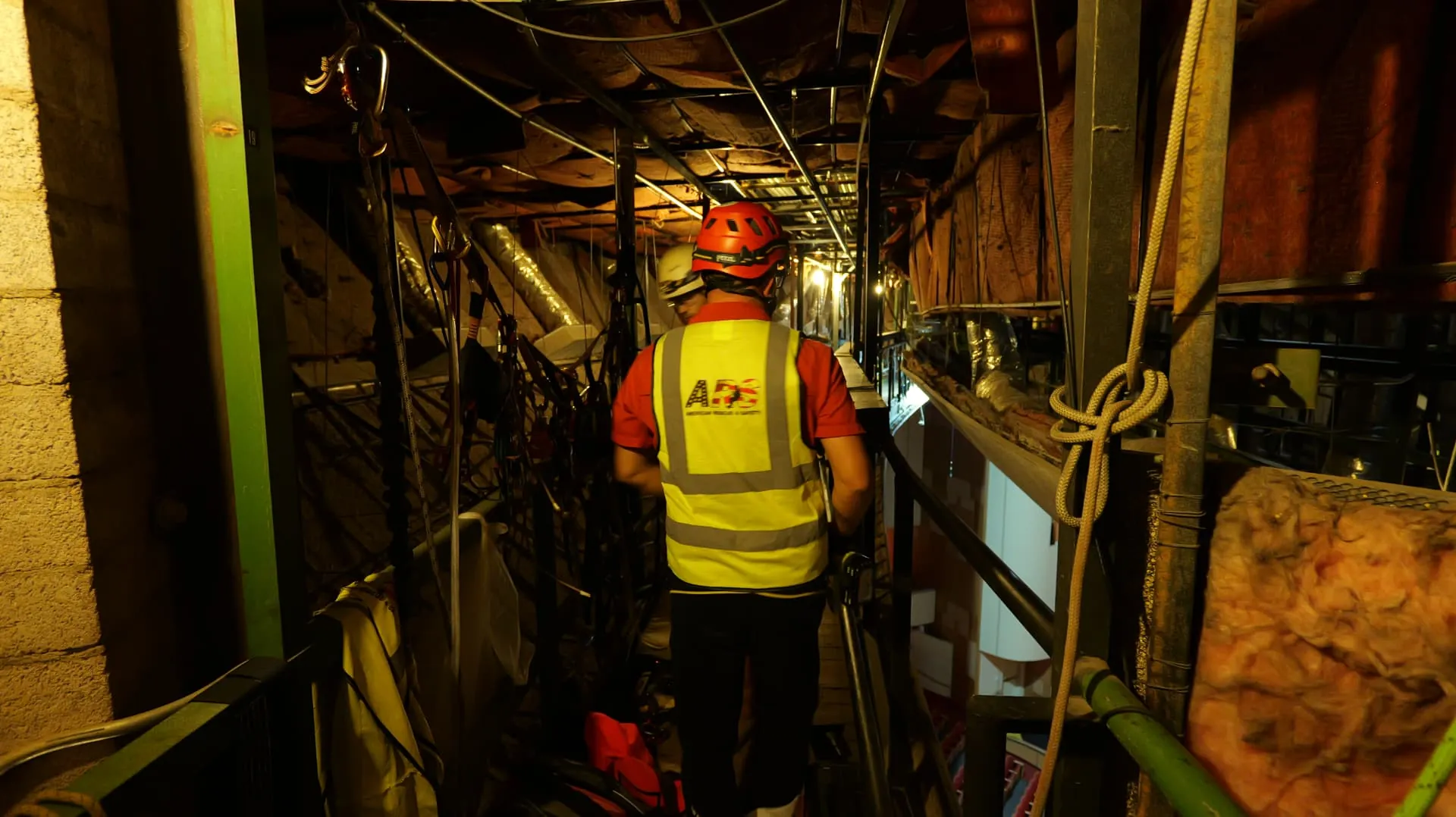 ARS technicians in an industrial interstitial access space