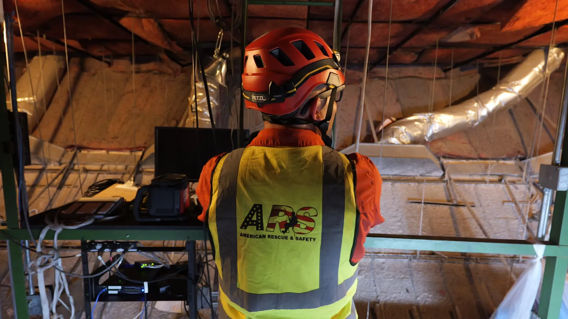 Rope access technician working at height on a Phoenix, AZ commercial building
