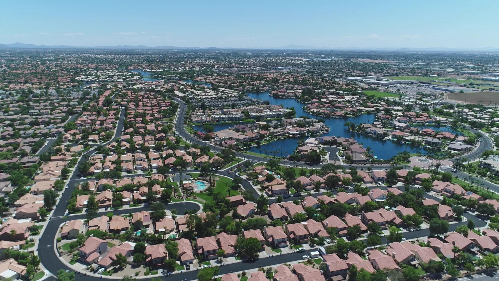 Aerial view of a Gilbert lake community and surrounding neighborhoods, rope access, confined space rescue and safety services in Gilbert, AZ