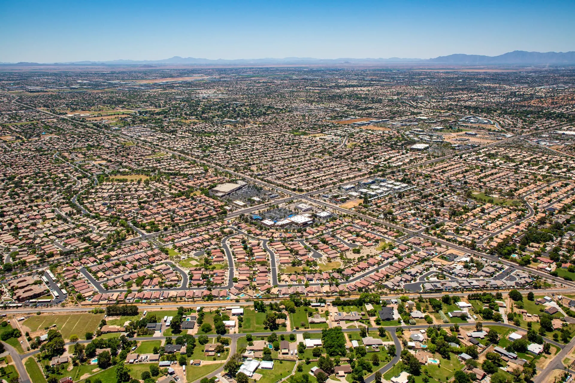 Wide aerial view of Gilbert neighborhoods across the East Valley, rope access, confined space rescue and safety services in Gilbert, AZ