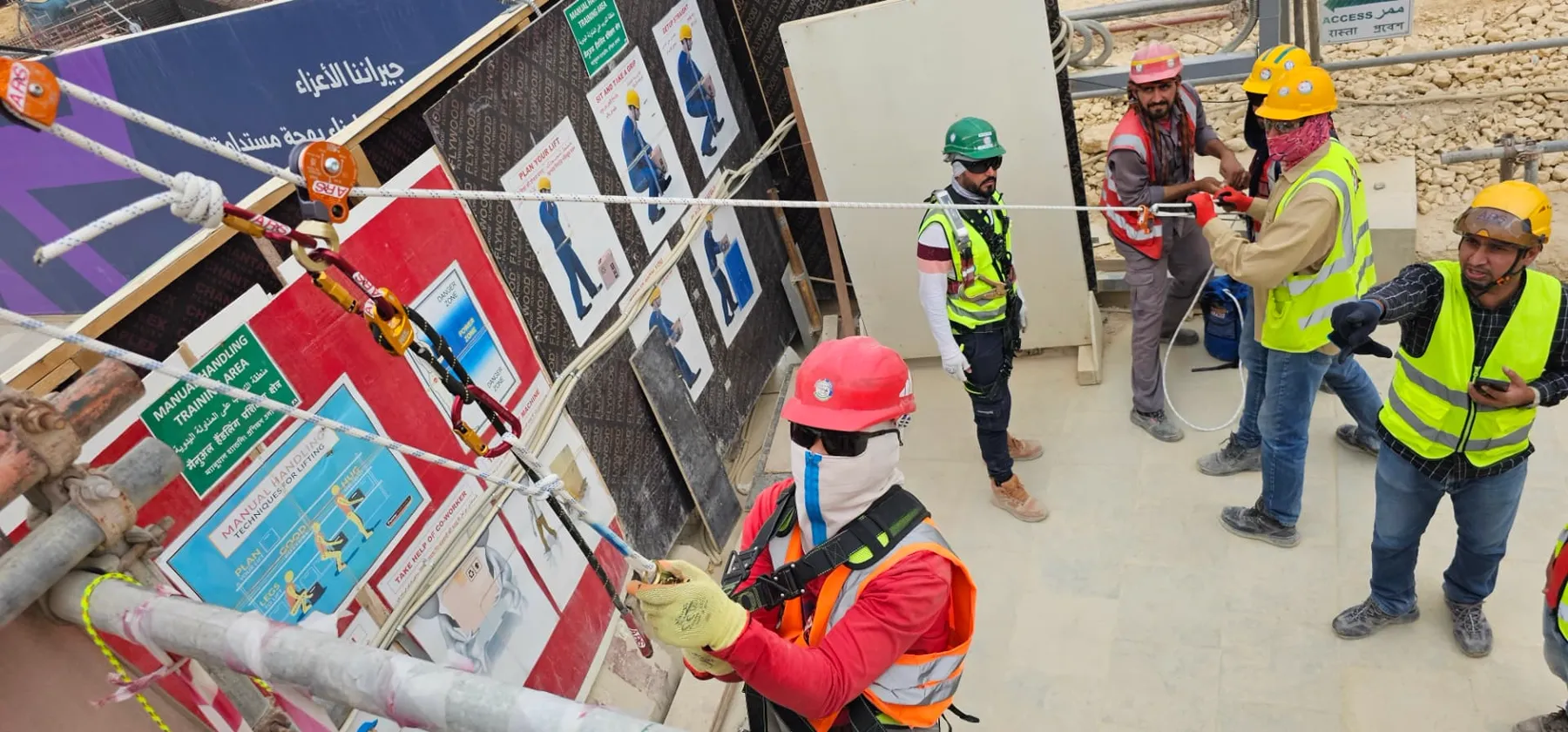 Crew practicing rope system rigging with ARS hardware during a hands-on site training session