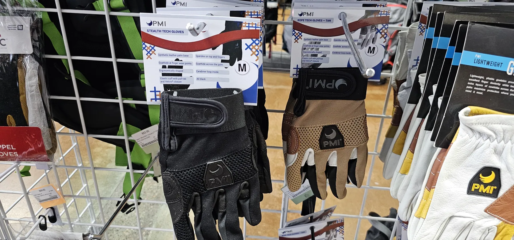 Gloves, hardware and rescue equipment laid out for inspection and inventory